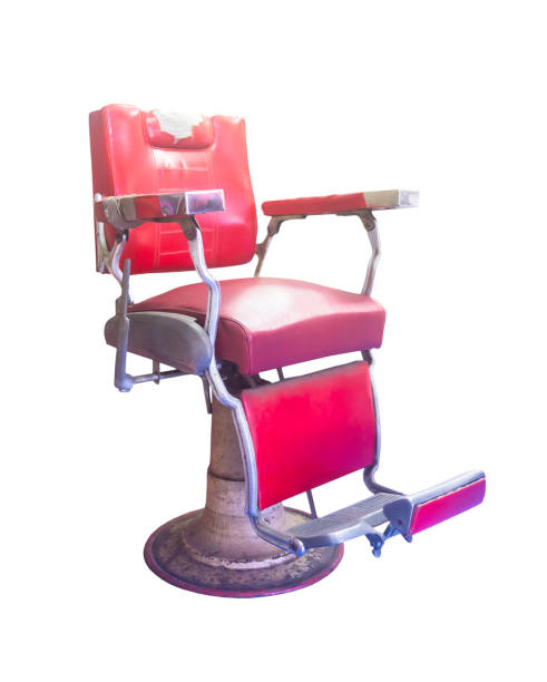 istock Old barber chair isolated 1000584348