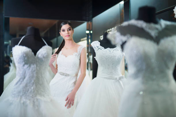 istock Beautiful bride searching for that special dress 1000600754