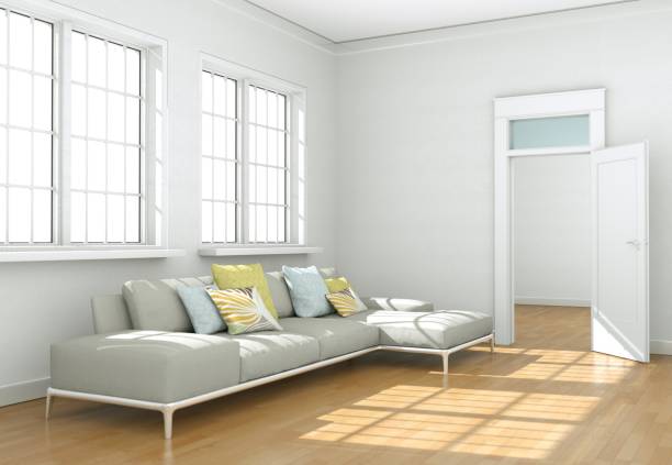 istock Bright room with grey sofa in front of window 1000648314