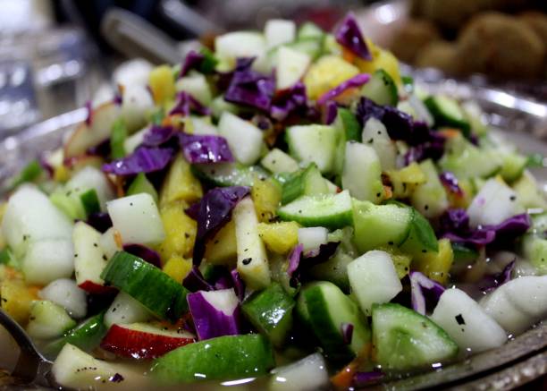 istock appetizing and colorful mixed fruit and vegetable salad dish served at a feast - dinner -  in Sri Lanka 1000648750