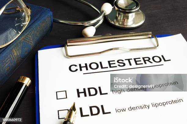 Cholesterol Hdl And Ldl Medical Form On A Desk Stock Photo - Download Image Now - Cholesterol, High Up, Low Density Lipoprotein