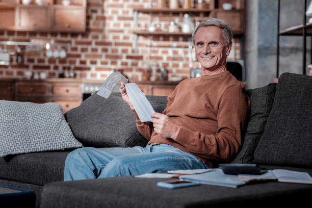 istock Happy male person posing on camera 1000673452