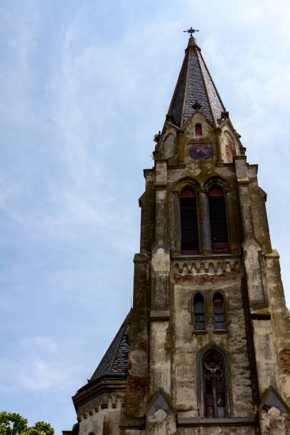 istock Scenic view on the old church tower, Gothic medieval architecture 1000678182