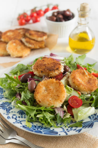 istock salad with shrimp / prawn fritters 1000701910