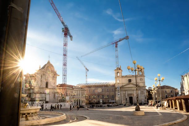 Piazza del Mercato dell'Aquila in reconstruction after the earthquake L'Aquila - Italy - October 14, 2017: Piazza del Mercato dell'Aquila in reconstruction after the earthquake abruzzi photos stock pictures, royalty-free photos & images