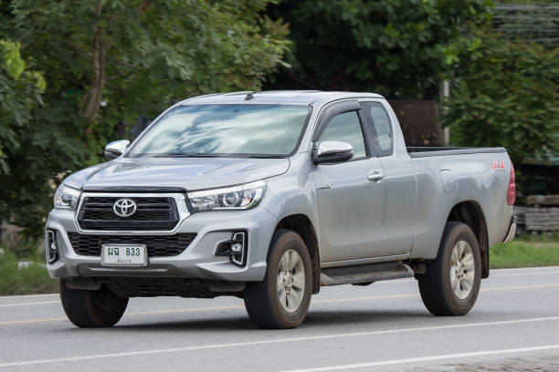 Private Pickup Truck Car New Toyota Hilux Revo  Rocco Chiangmai, Thailand - June 28 2018: Private Pickup Truck Car New Toyota Hilux Revo  Rocco. On road no.1001, 8 km from Chiangmai city. toyota hilux stock pictures, royalty-free photos & images