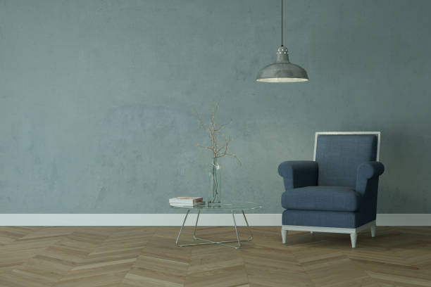 istock Bright room with blue chair in front of a blue wall 1000716630