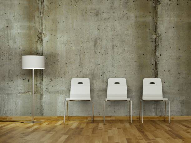 istock Room with three white in front of a concrete wall 1000720070
