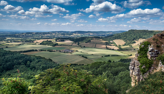 a view from Sutton Bank near the white horse in summer with blue sky