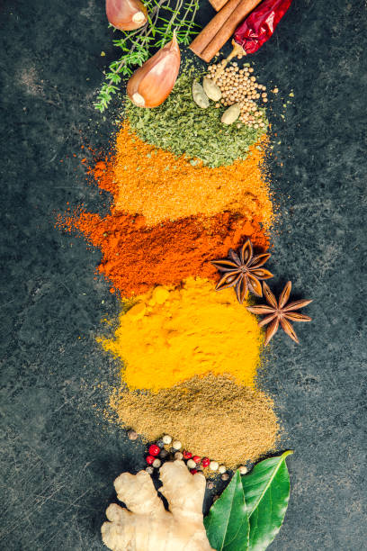istock Spices and herbs on a dark background 1000804298