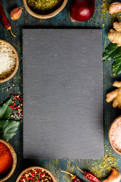 istock Spices and herbs on a dark background 1000804302