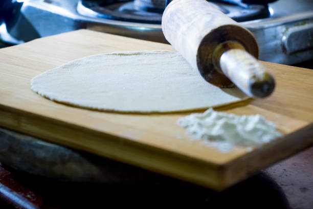 istock Image of an indian Bread shown in a kitchen while cooking 1000811064