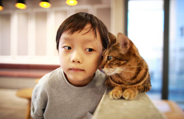Cute children and cat
