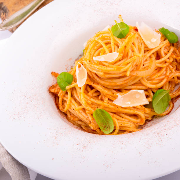 istock Pasta with cherry tomatoes, garlic and Parmesan cheese 1000830494