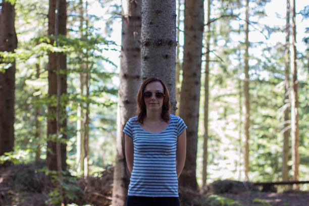 istock Girl in a forest 1000834194