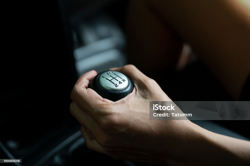 Hand Using Gear Shift Close Up Hand With Manual Gear Shift Lever Car Transportation Concept ...