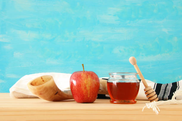 istock Rosh hashanah (jewish New Year holiday) concept. Pomegranate raditional symbol. 1000838470
