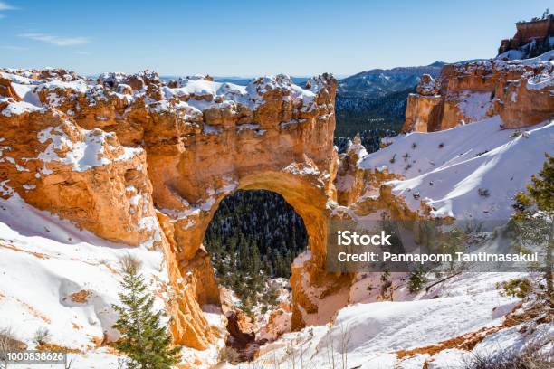 Nature Bridge Rock Formation At Bryce Canyon National Park With Snow In Winter Utah Usa Stock Photo - Download Image Now