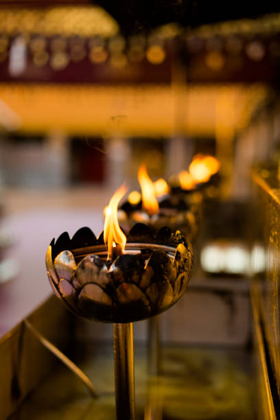 istock Candles in buddhist temple 1000838912