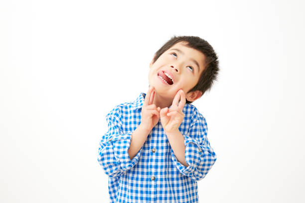 istock Asian boy making his face fanny 1000839170