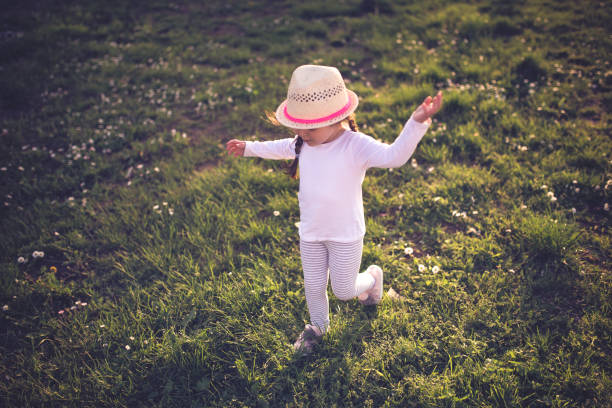 istock Cute toddler running in the park 1000842310