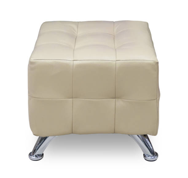 istock Beige leather pouf with metal legs and shadow, isolated on white background 1000845722