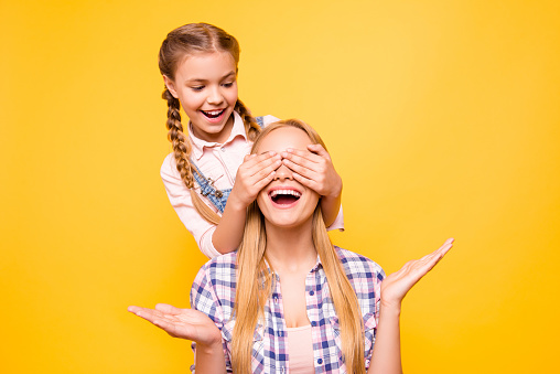 Guess who! Casual clothes blonde hair pigtails concept. Portrait of funky cute excited playful joyful candid carefree lovely girls playing game covering eyes with palms isolated bright background