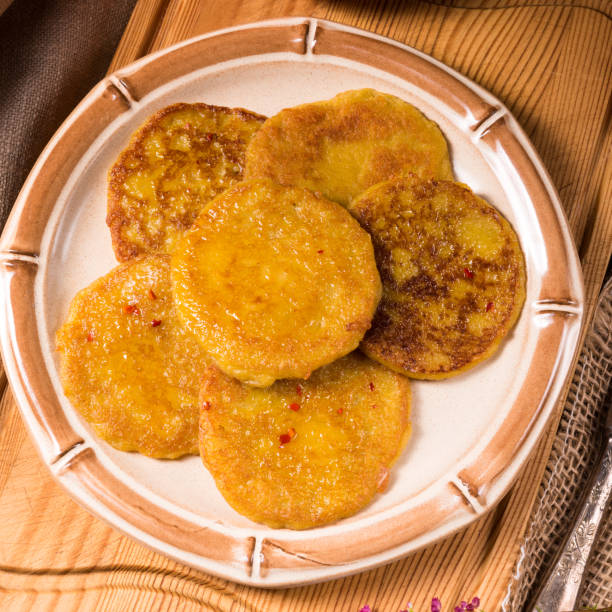 istock Potato pancakes with pumpkin puree 1000851280