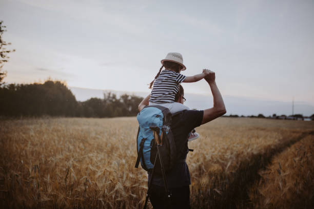istock Father and daughter hiking together 1000854434