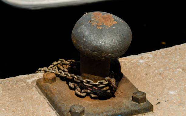 istock mooring post on the waterfront in a small marina, element for mooring ships in the harbor 1000857208