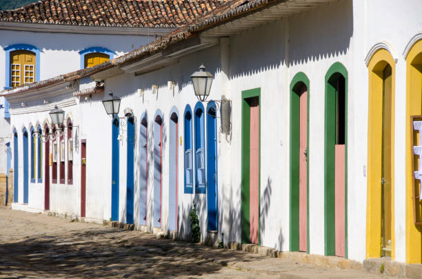 white houses with colored doors and windows in Paraty stock photo