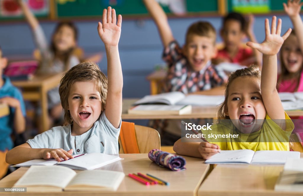 Child Shouting Out In Class Elementary Students Shouting While Raising Their Hands To Answer The ...
