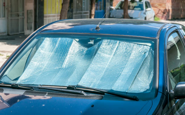 istock Sun reflector on the windscreen or windshield as protection of the car plastic indoor panel from direct sunlight and heat 1000899022