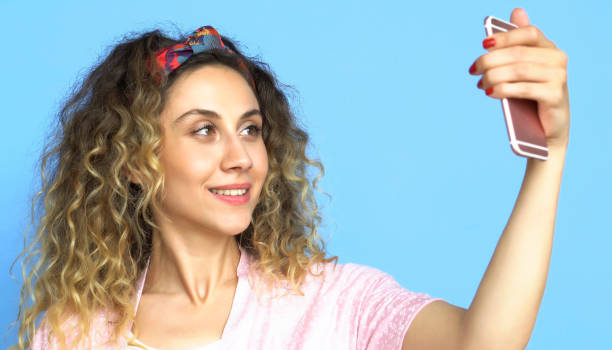 istock Women Selfie - Stock image 1000918444