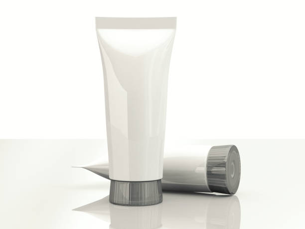 istock Two Tubes with cosmetic cream isolated on white 1000918456
