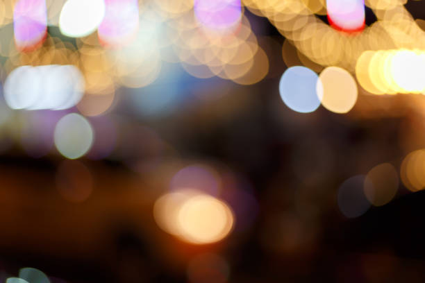 istock Abstract background of colorful bokeh lights with defocused effe 1000928770