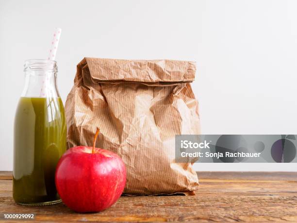 Green Smoothie Red Apple And A Paper Bag Stock Photo - Download Image Now - Lunch Break, Paper Bag, Breakfast