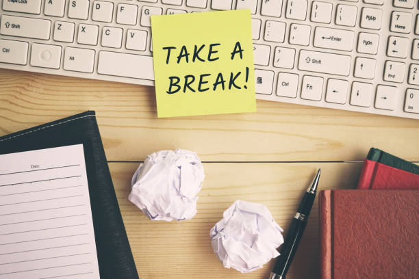 istock Take a break text on yellow adhesive paper 1000946822