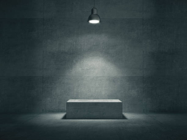 istock Pedestal for display,Platform for design,Blank product stand with lamp light spot .3D rendering. 1000951792