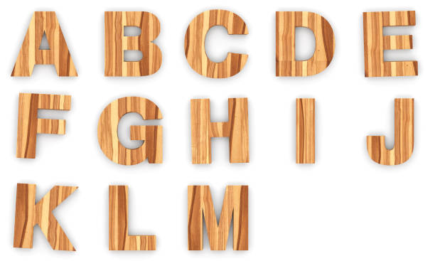 istock Wooden alphabet letters isolated on white background 1000953020