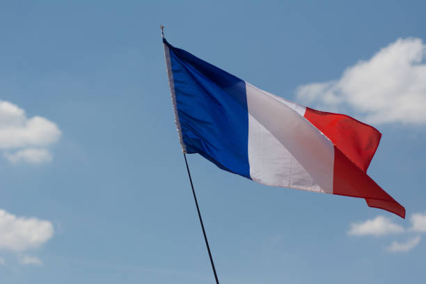 istock The French flag Flying in Breaze 1000959384
