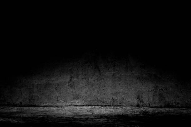 istock abstract background black room dark concrete wall and floor 1000959490