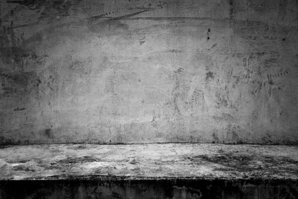 istock abstract background black room dark concrete wall and floor 1000962590