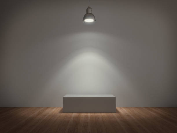 istock Pedestal for display,Platform for design,Blank product stand with lamp light spot .3D rendering. 1000962874