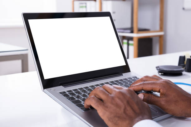 istock Close-up Of Man Using Laptop 1000962922