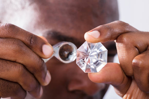 istock Person Checking Quality Of Diamond 1000963148
