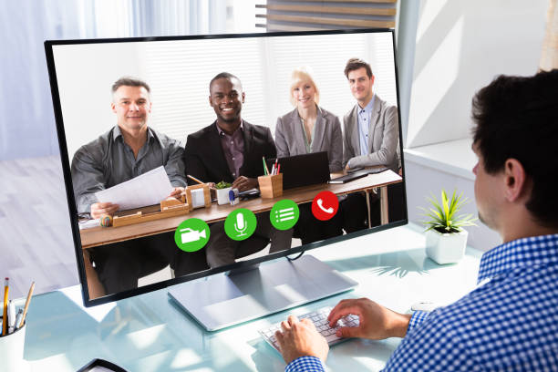 istock Businessman videoconferencing with his colleagues 1000963950
