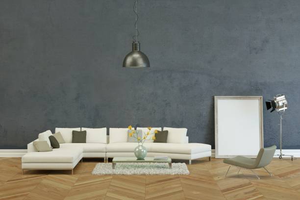 istock White sofa in modern scandinavian design with grey wall 1000975538