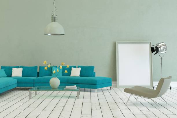 istock Blue sofa in modern scandinavian design with grey wall 1000975568