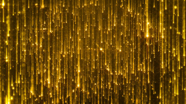 istock 3D rendering of the falling of bright particles. Starfall on a dark background with shiny and glowing asterisks 1000980840